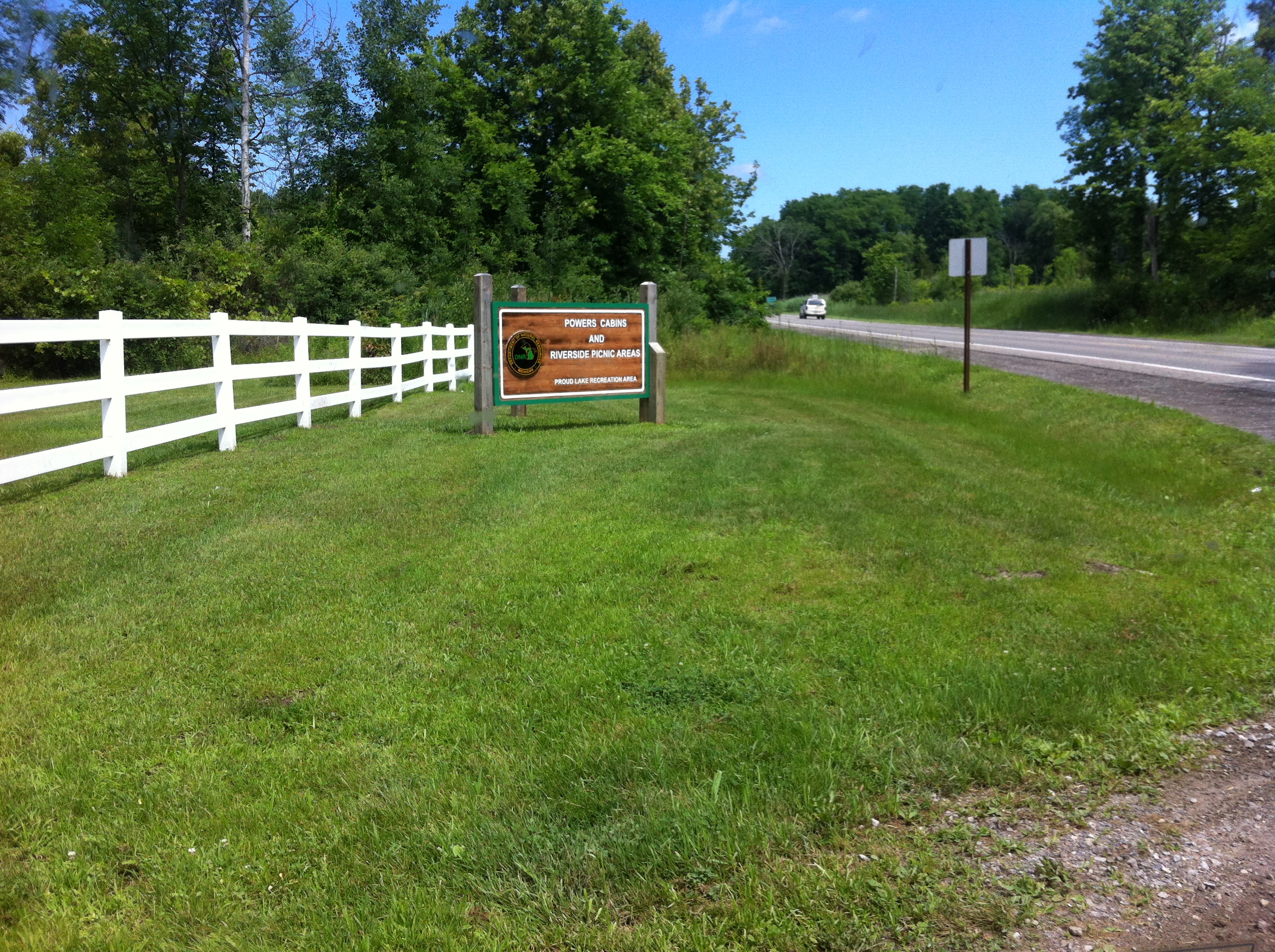 This sign is located NW of the street you will turn left off of to get onto an unnamed road to the party site.